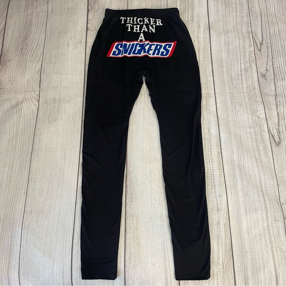 “Thicker Than A Snickers” Black Graphic Leggings Size Medium